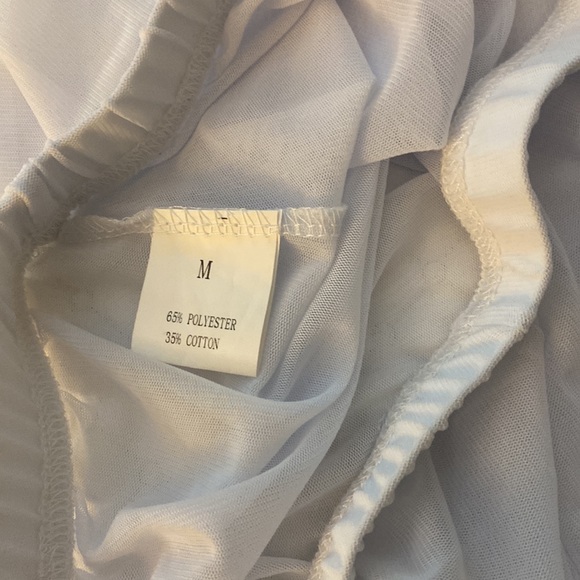 Sheer white long pants with side ruffles. Size Med, 65% polyester 35 % cotton - Picture 5 of 5